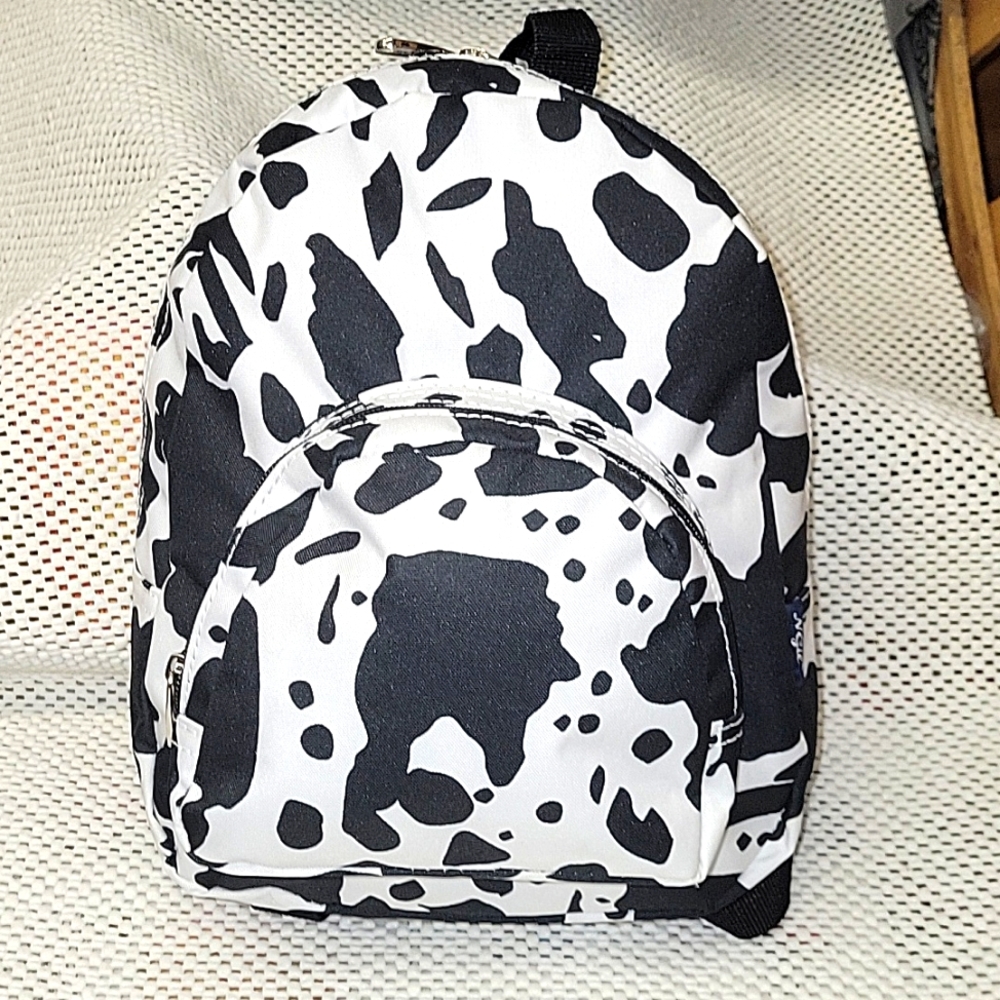 Cow print canvas sm.  backpack. Adjustable straps.